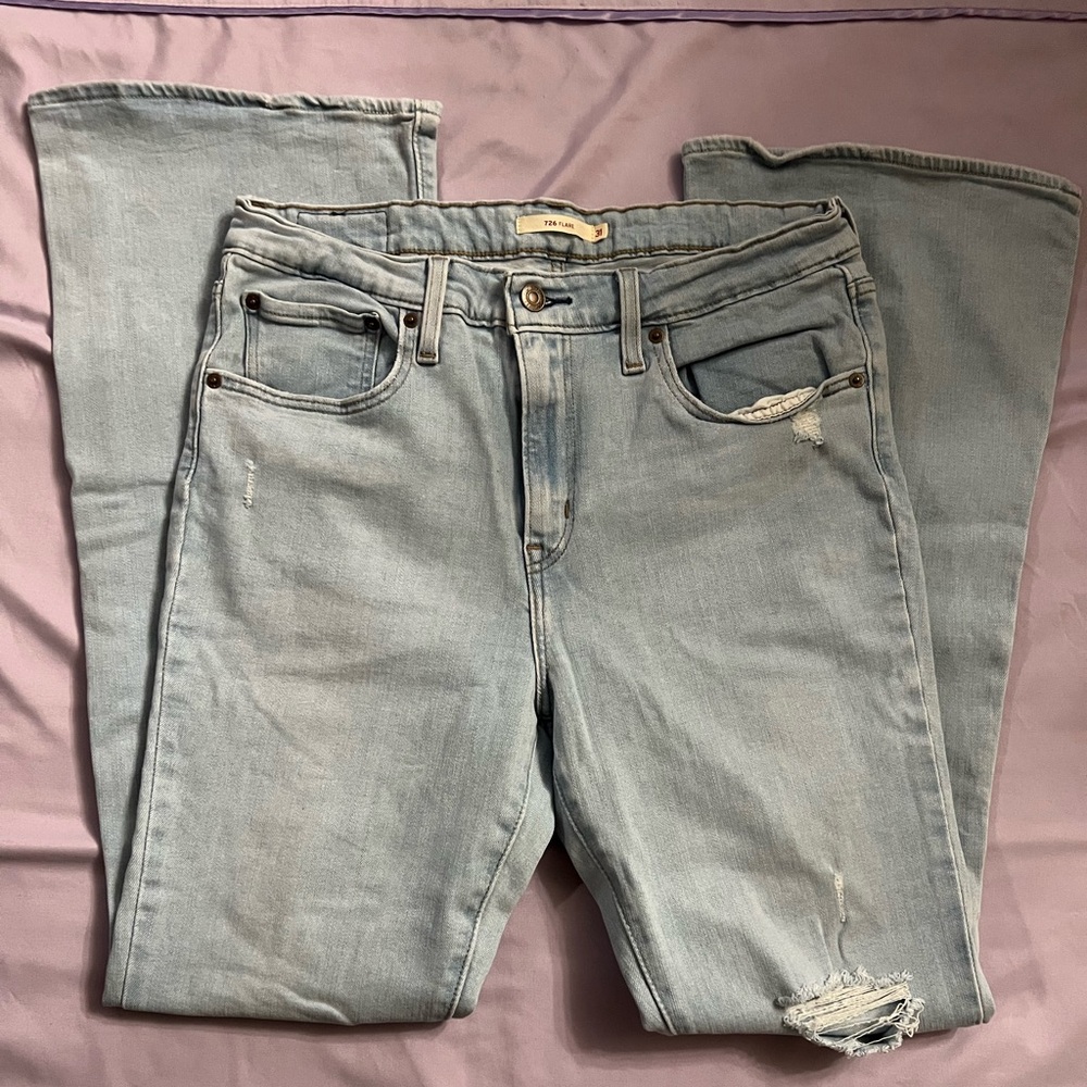 Levi's Blue Flare Leg Jeans with Distressed Details